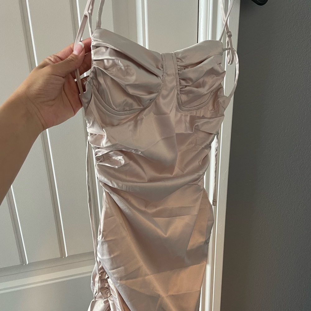 Light pink backless dress.